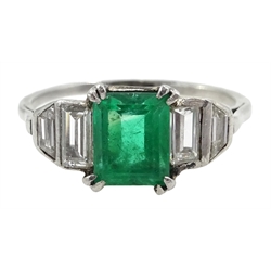  Art Deco platinum (tested) emerald cut emerald and graduating baguette cut diamond five stone ring, circa 1920's/30's  