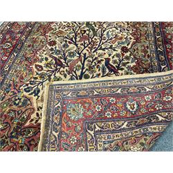 Persian ivory and red ground Tree of Life rug, repeating boarder