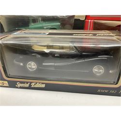 Seven 1:18 scale die-cast models by Ertl, Road legends, Maisto, Solido etc including two Coca Cola promotional vehicles; five boxed (7)