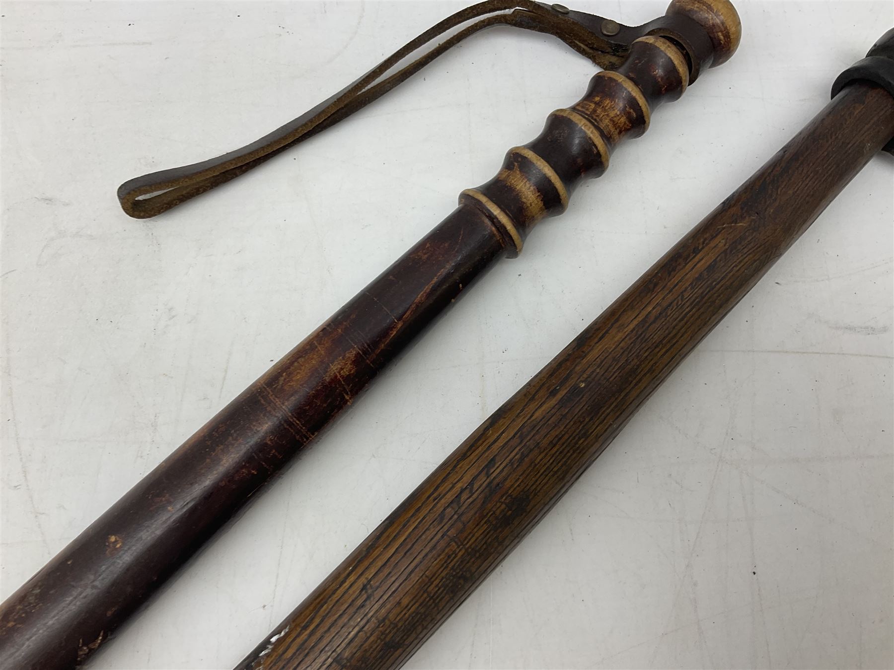 Victorian painted turned wood police truncheon by Field, dated 1851 painted in polychrome with the arms of Blackburn, including crest flanked by the date 18/51 and circumscribed BLACKBURN BOROUGH POLICE, stamped 'FIELD 233 HOLBORN'. L40.5cm. Auctioneer's Note: The borough of Blackburn received its Charter of Incorporation on 28 August 1851; together with two other unmarked turned wooden truncheons (3)