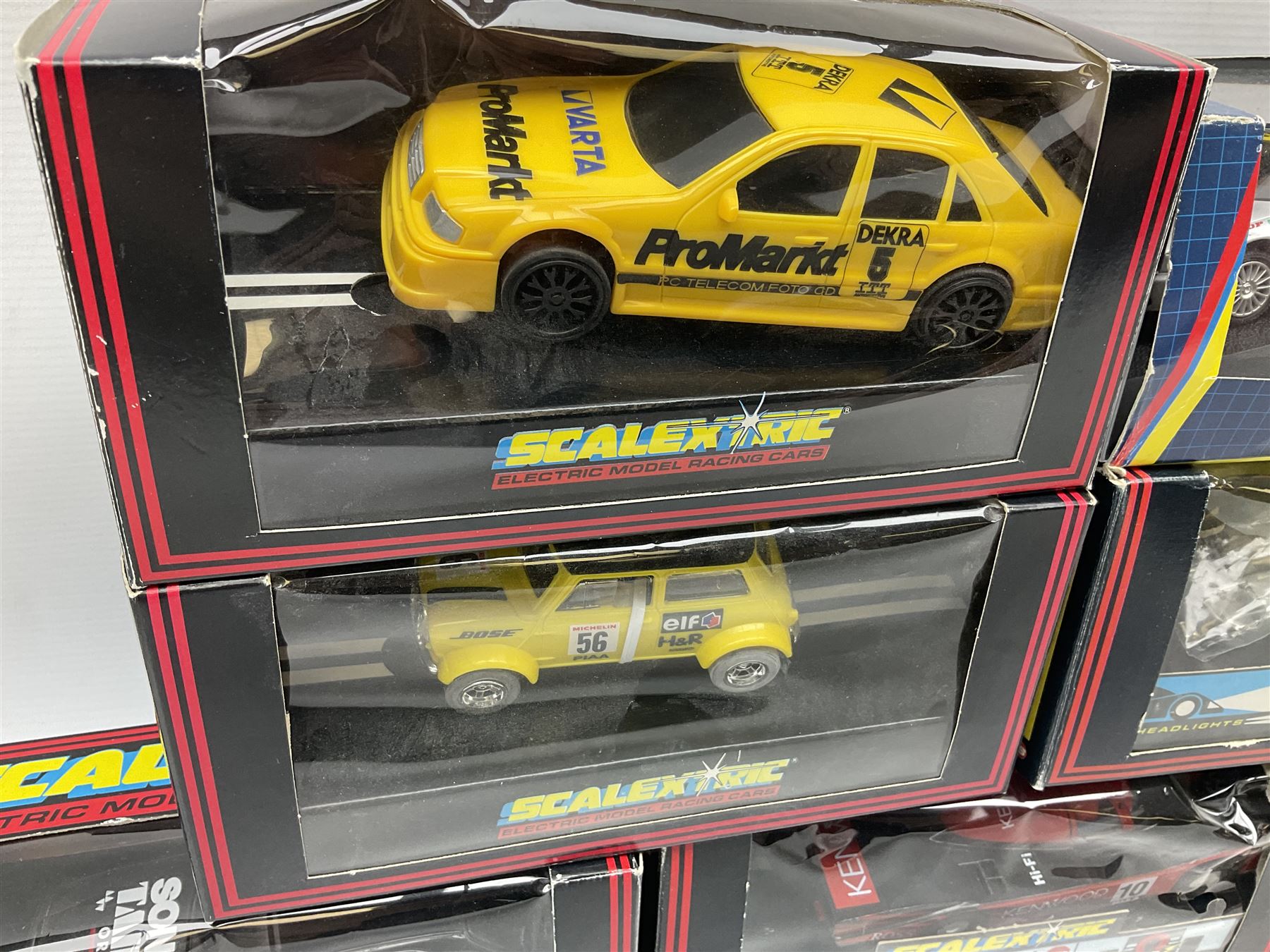 Scalextric by Hornby - seven cars comprising C486 Porsche 962 Kenwood, C467 Tyrrell 018, C601 Mercedes Sonax, C699 Mercedes Promarket #5, C468 Sauber Mercedes, C2104 Mini Yellow No.56 and C2002 Audi A4; all boxed (7)