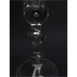  Georgian baluster wine glass, bell shaped bowl with tear with cushioned and flattened knop stem with tear inclusions on folded slightly domed base, H15cm   