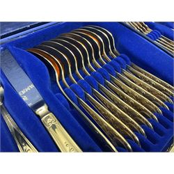 Bestecke Solingen canteen of gold plated cutlery for twelve place settings, including ladle, cake slice, fish servers, fish knives and forks, 108 pieces total, contained within a briefcase 