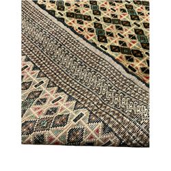 Persian Baluchi rug, the field decorated with geometric motifs, repeating patterned border 