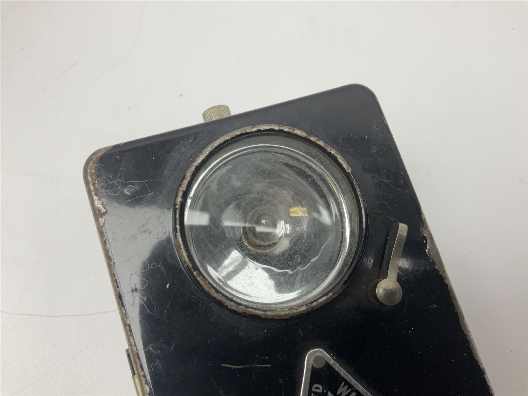 Police - Victorian turned hardwood truncheon with traces of decoration and VR cypher L42cm; Humberside Police helmet with Queens Crown helmet plate; hand lamp inscribed 'The Inspector'; and small pair of pewter figures of police officers (5)