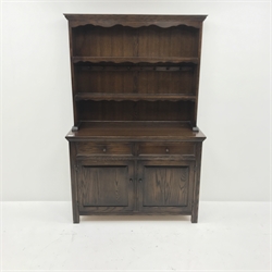  20th century oak dresser, raised two tier plate rack above two drawers and two cupboards, stile supports, W122cm, H186cm, D44cm  