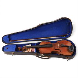 Early 20th century copy of an Antonius Stradivarius violin, with two piece back, ebonised finger board and tuners, the interior label reading 'Modele dapres Antonius Stradivarius Cremonensis anno 1721', in hard case with bow, length 62cm