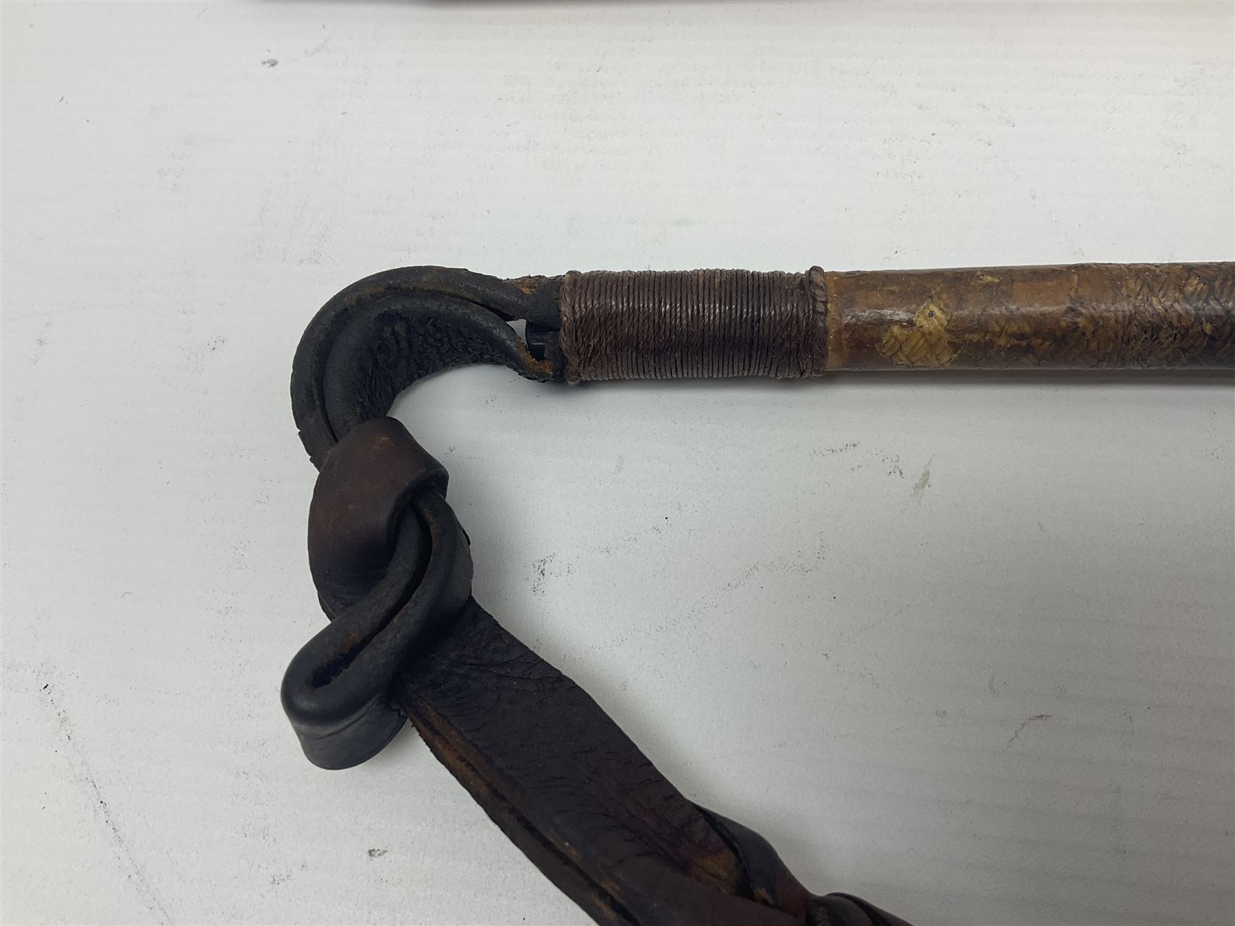 Late Victorian leather hunting whip, with antler handle and presentation engraving to hallmarked silver collars, together with a horse measuring walking stick, whip L205cm
