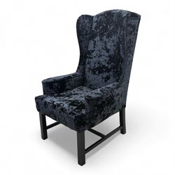 Oka - Pair of contemporary upholstered wingback armchairs, in black and blue textured velvet effect fabric, with tall scroll wing sides and square tapered legs joined by stretchers