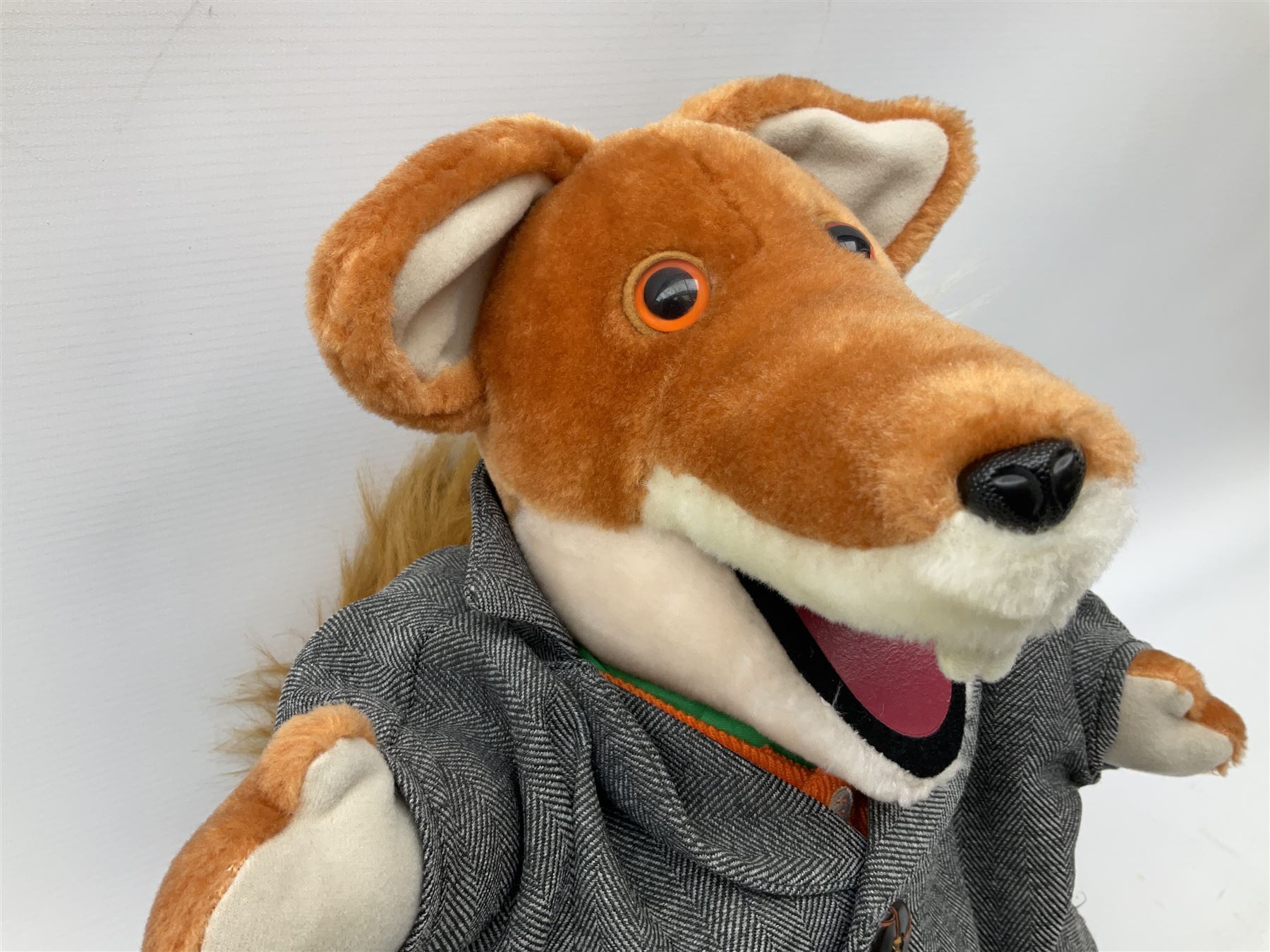 Vintage Basil Brush plush toy, in a tartan jacket together with a talking Basil Brush plush toy, tallest example H46cm
