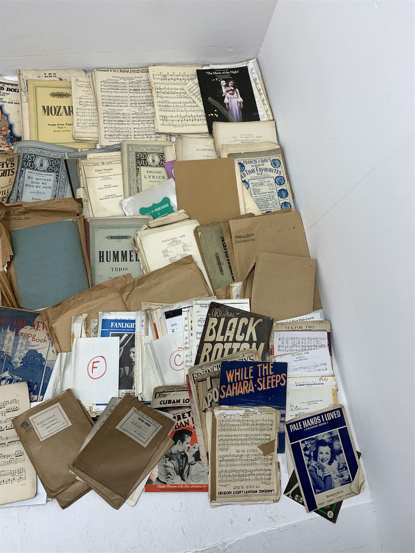 Steinway & Sons - late 19th century figured walnut upright piano, iron framed and overstrung, model no. 56174 circa. 1886, W154cm, H137cm, D70cm, together with a quantity of sheet music