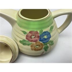 Clarice Cliff for Newport Pottery three piece tea service, in Nosegay pattern, comprising teapot, milk jug and sugar bowl, with printed mark beneath, teapot H12.5cm