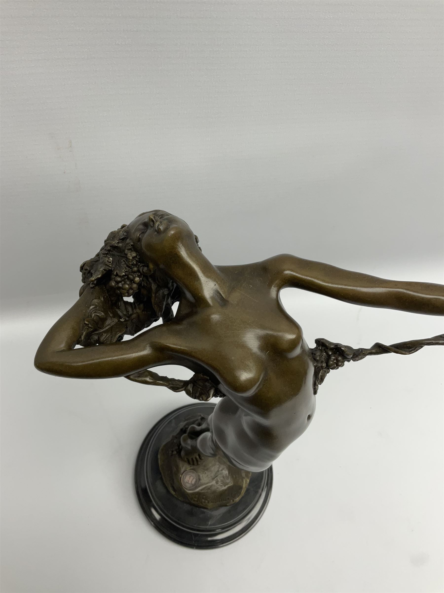Bronze figure of a nude female holding a vine, after 'H. Frishmuth', with foundry mark on socle base, H38cm