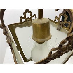 Gilt metal lantern, with frosted glass and foliate decoration, together with another lantern 