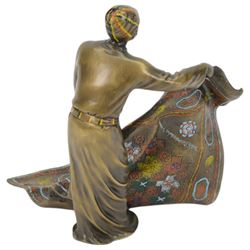 After Franz Bergmann bronzed sculpture of a carpet seller, with colourful painted highlights throughout, H19cm