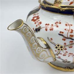 Early 20th century Royal Crown Derby teapot, decorated in a variant of the Imari pattern with blue and red prunus blossoms, with printed mark beneath including illustration date code for 1927, H14cm
