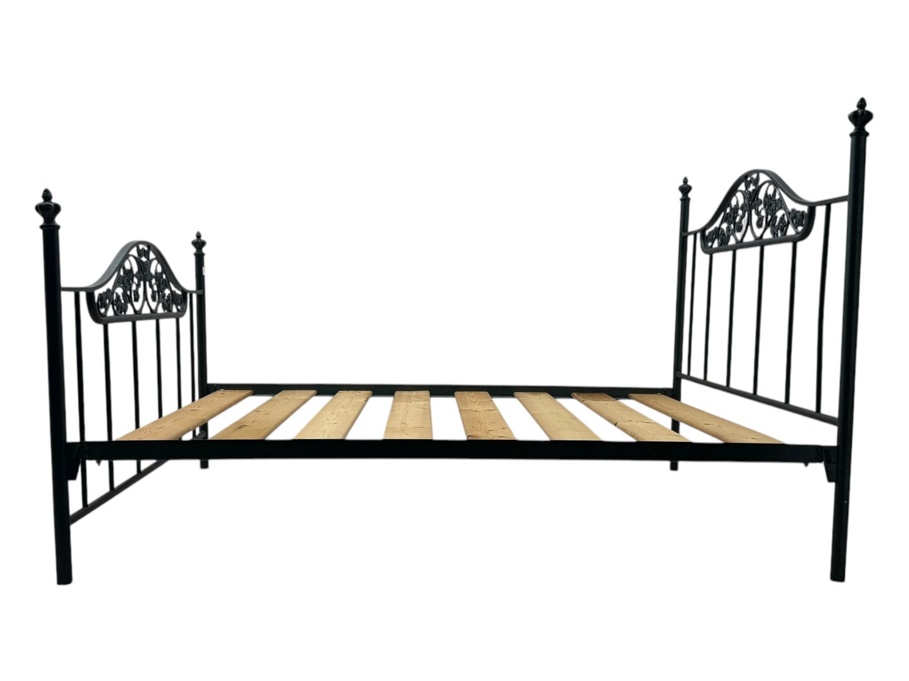 Contemporary metal double bed frame, shaped head and footboards with foliate cast panels and vertical rod supports, the corner posts with urn-shaped finials, finished in a mottled verdigris-style green, with pine slatted base