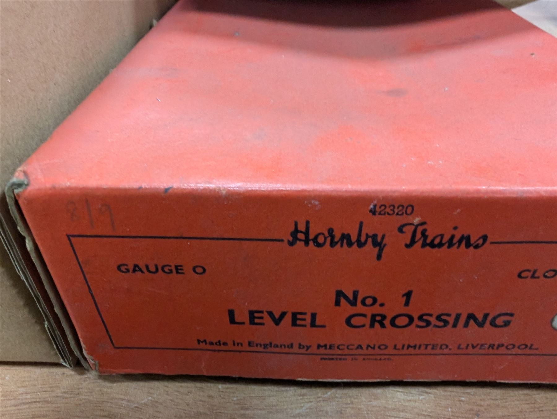 Hornby 'O' gauge 42380 No.2 Turntable, 43063 Points and 42320 No. 1 Level Crossing, all boxed, together with two tin plate passenger coaches, Hornby 'O' gauge LMS tender, three plastic 'O' gauge wagons, Hornby mechanisms, HM Duette Transformer Controller and other accessories