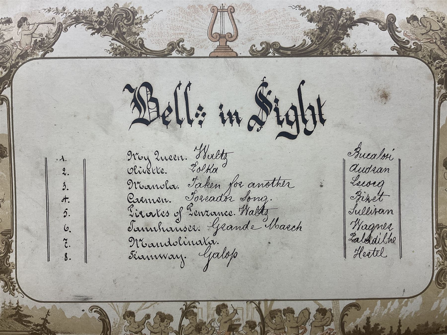 Large late 19th century Swiss bells-in-sight musical box with 27.5cm cylinder playing eight airs on a 27cm two-piece comb with seventy-seven teeth and six graduated engraved saucer bells with strike/silent facility; in crossbanded rosewood and ebonised case, the front and hinged lid inlaid with musical trophies, opening to reveal a song card under the lid and hinged glazed cover to the movement; serial no.7539 L53cm