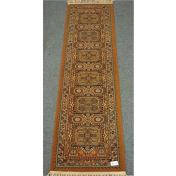  Persian red ground runner rug, six repeating medallions, 69cm x 240cm  