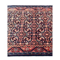 North West Persian Mahal indigo ground runner rug, the field decorated with all-over crimson Herati motifs, the guarded border with trailing geometric designs