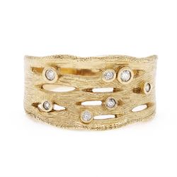 9ct gold diamond bubble ring, bezel set with seven round brilliant cut diamonds, in a text...