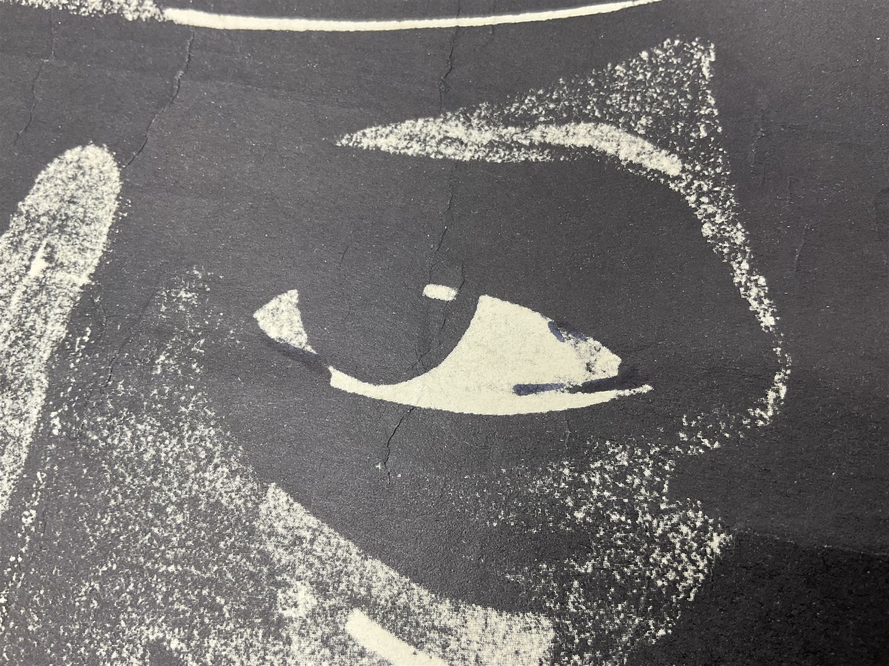 German monochrome 'Gestapo' poster, probably post-WW2, depicting the head of a grim faced Gestapo officer in uniform 55 x 42cm; unframed