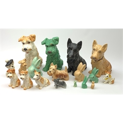 A collection of Sylvac Scottie dog figures, to include no 1205, 1378, 1209, and 1380, together with a number of Sylvac rabbit figures. (Qty). 