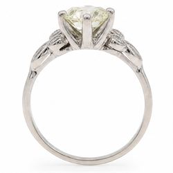 Platinum diamond ring, six claw set with a single old cut diamond of approx 1.35 carat, each shoulder milgrain set with two single cut diamonds and a marquise cut diamond, stamped Plat