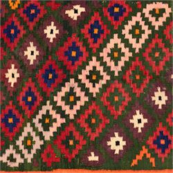 North East Persian Sumak flatweave kilim, woven with an all-over arrangement of stepped diamond motifs, including a diagonal band of contrasting colours in shades of red, indigo, green, pink, and ivory, framed by multiple geometric borders incorporating serrated chevron designs  