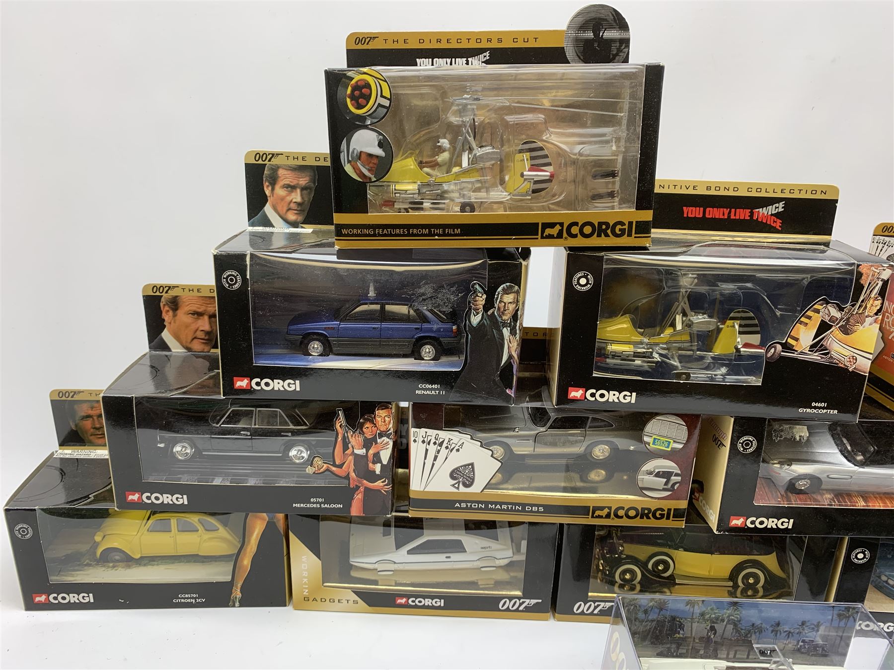 Corgi James Bond - seventeen models from various films including Goldfinger, Octopussy, Diamonds Are Forever, For Your Eyes Only, Casino Royale, Live And Let Die, You Only Live Twice etc including ten from The Definitive Bond Collection and seven from The Director's Cut, all in window boxes; together with two others by Fabbri in perspex display cases (19)