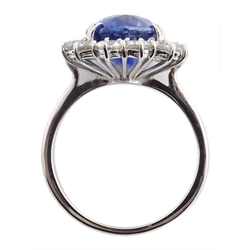  18ct white gold oval sapphire and diamond cluster ring, sapphire approx 5.7 carat, diamonds approx 1.3 carat  