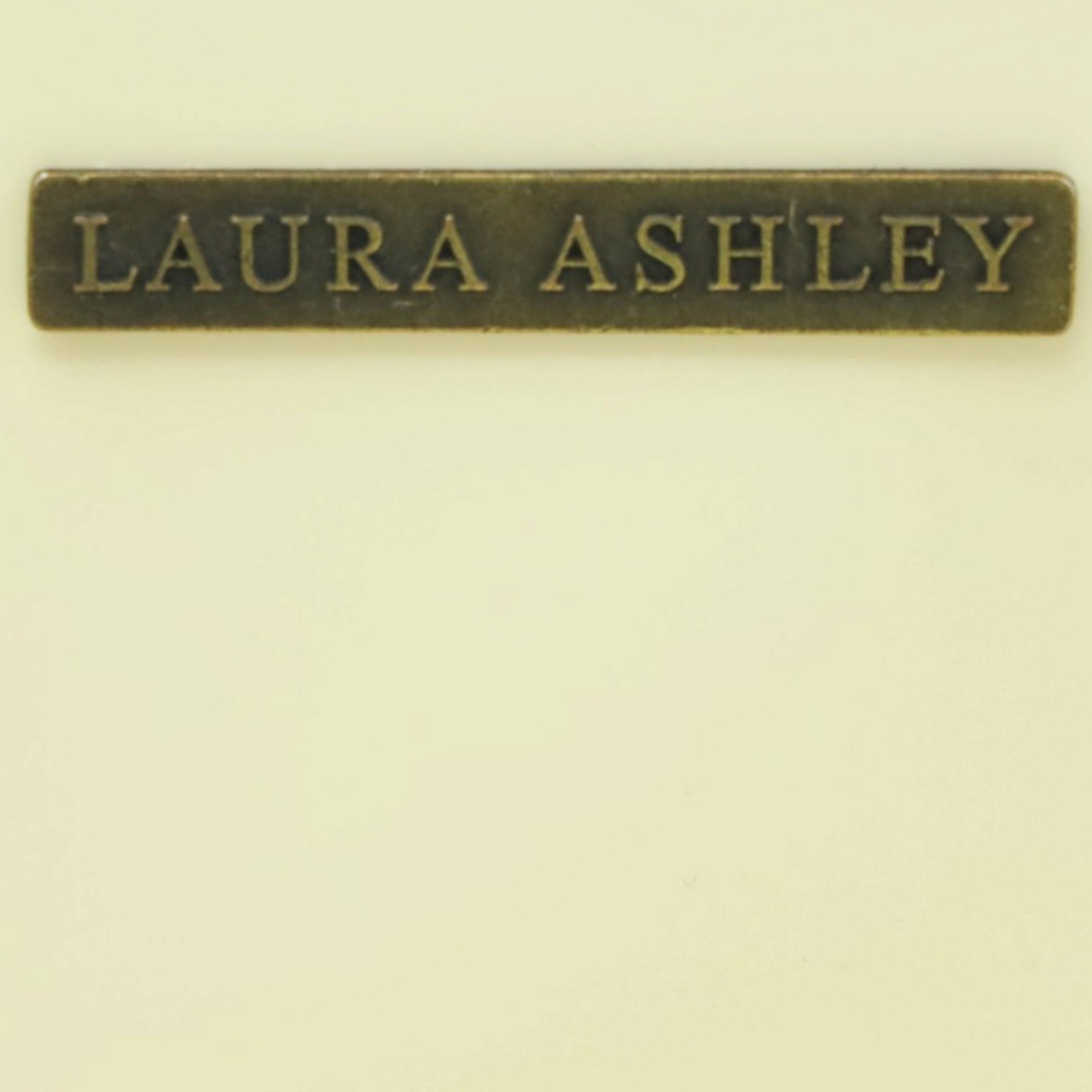 Laura Ashley - 'Clifton' demi-lune chest, fitted with four graduating bow-front drawers with brass swan neck handles, raised on turned supports, in ivory finish