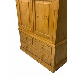 Solid pine double wardrobe, fitted with three drawers