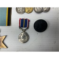 WWI group of four miniature medals comprising British War Medal, Victory Medal, India General Service Medal 1908-35 with Afghanistan NWF 1919 clasp and Territorial Force War Medal; 1939-1945 War Medal and Star; RASC and KRRC cap badges and buttons, Victorian military buttons; WWII medal slips etc