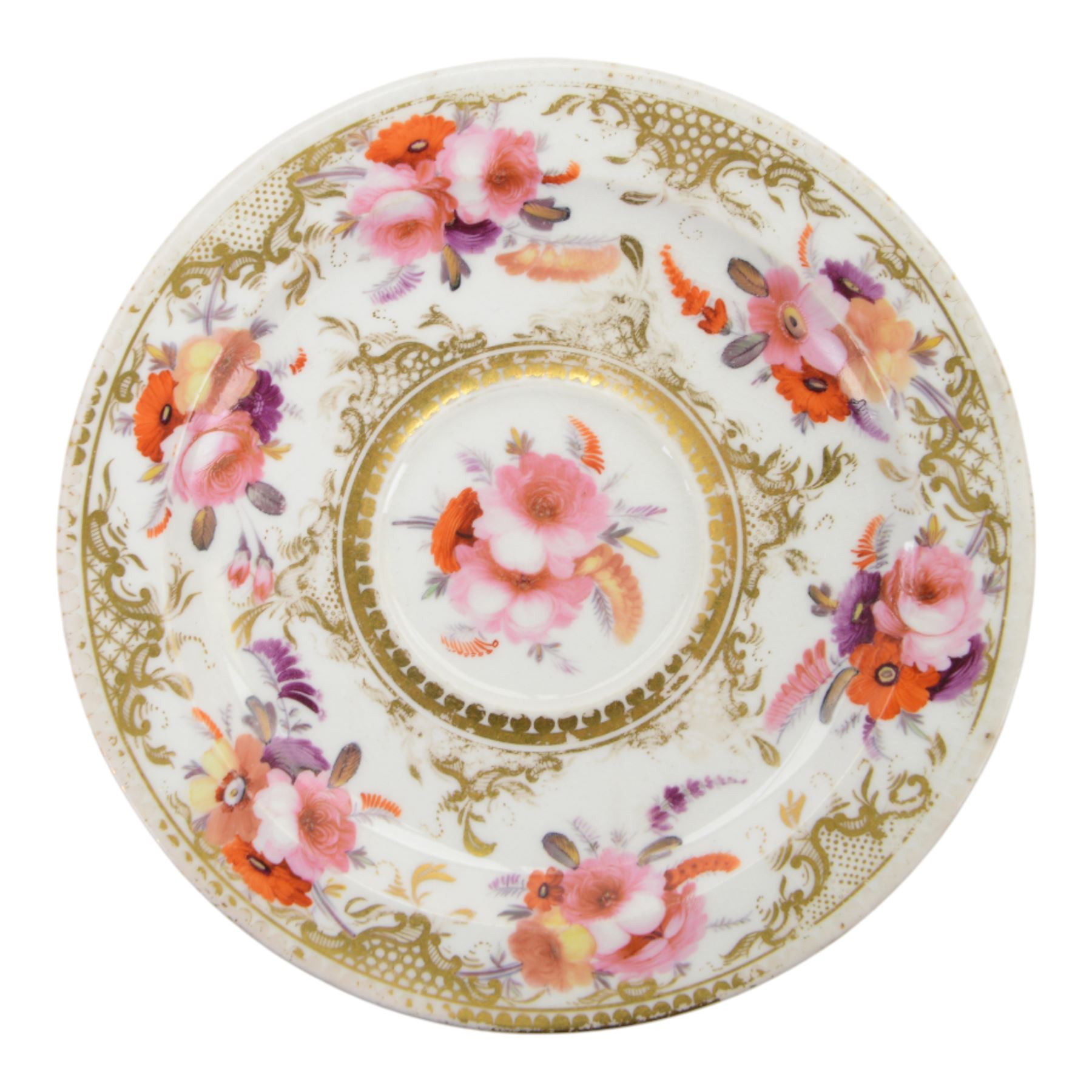 Coalport teawares, circa 1820-1840, comprising set of four trios, coffee cups, teacups and saucers, and slop bowl, decorated in the 830 pattern, with floral sprays and gilt shaped reserves, two further coffee cups and saucers, decorated with floral sprays upon blue grounds/with blue borders, and a similar coffee cup