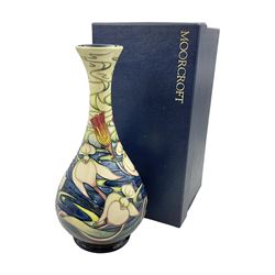 Moorcroft vase, of bottle form, decorated in the Orchid Arabesque pattern by Emma Bossons, circa 2002, H31.5cm, with original box 