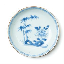 Pair of 18th century Chinese blue and white ‘Nanking Cargo’ saucer dishes painted with bamboo and peony, with Christie's lot label No 5258 D11.5cm