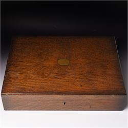  Canteen of silver cutlery comprising twelve dessert spoons, twelve dessert forks, twelve teaspoons, four table spoons and four table forks in oak case London 1938 Maker Josiah Williams & Co