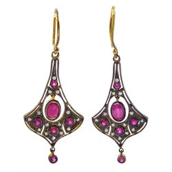 Pair of gold and silver milgrain set ruby and diamond pendant earrings 