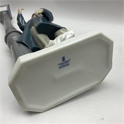 Five Lladro figures, including The Lamp Lighter no 5205,  Girl and Kittens no 6102, Cat no 5113 etc