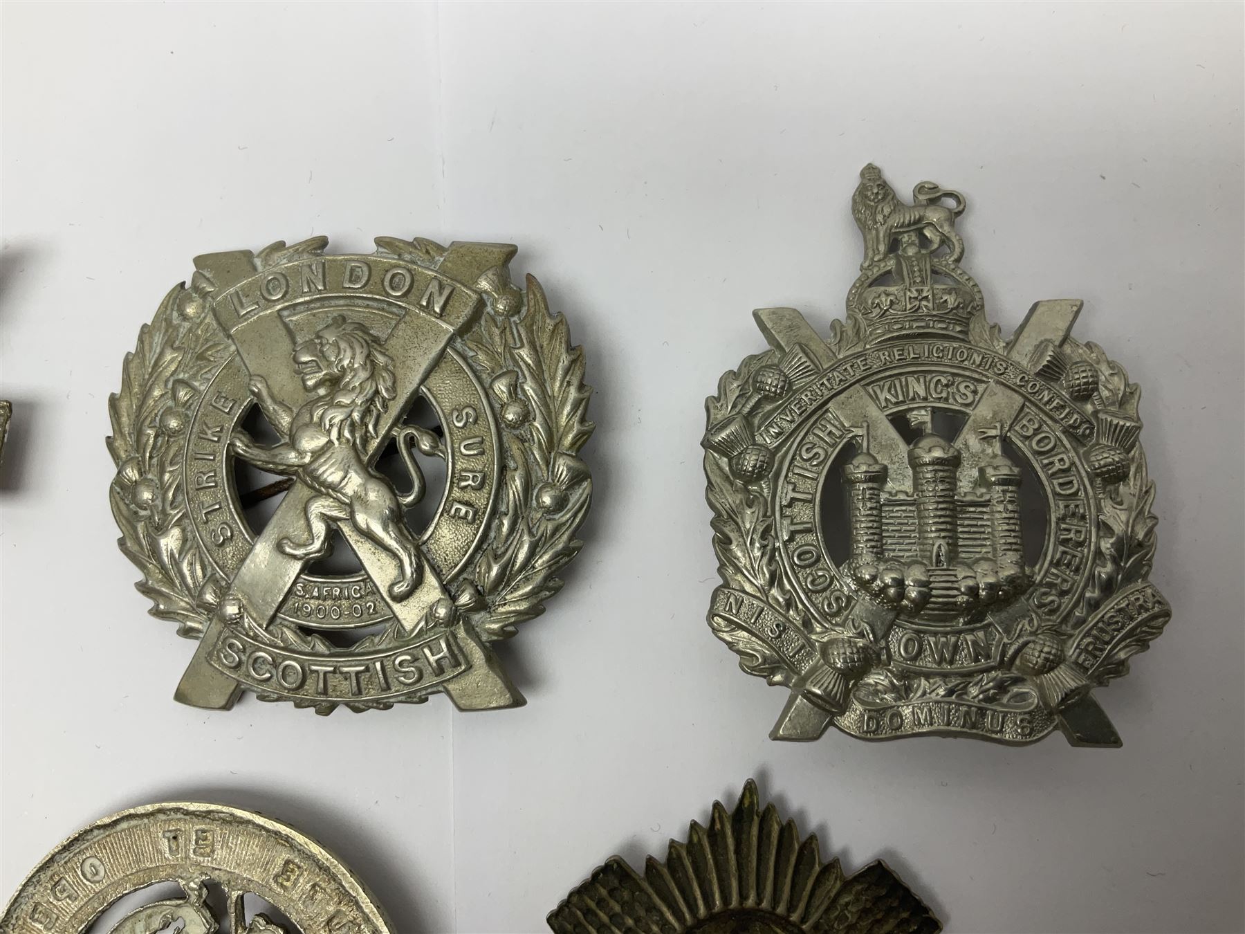 Nine Scottish glengarry badges - 6th Fifeshire Volunteer Battalion Black Watch, Lowland Regiment, Highland Regiment, Black Watch, Argyll & Sutherland Highlanders, Kings Own Scottish Borderers, Cameron Highlanders, The Royal Scots and London Scottish (9)