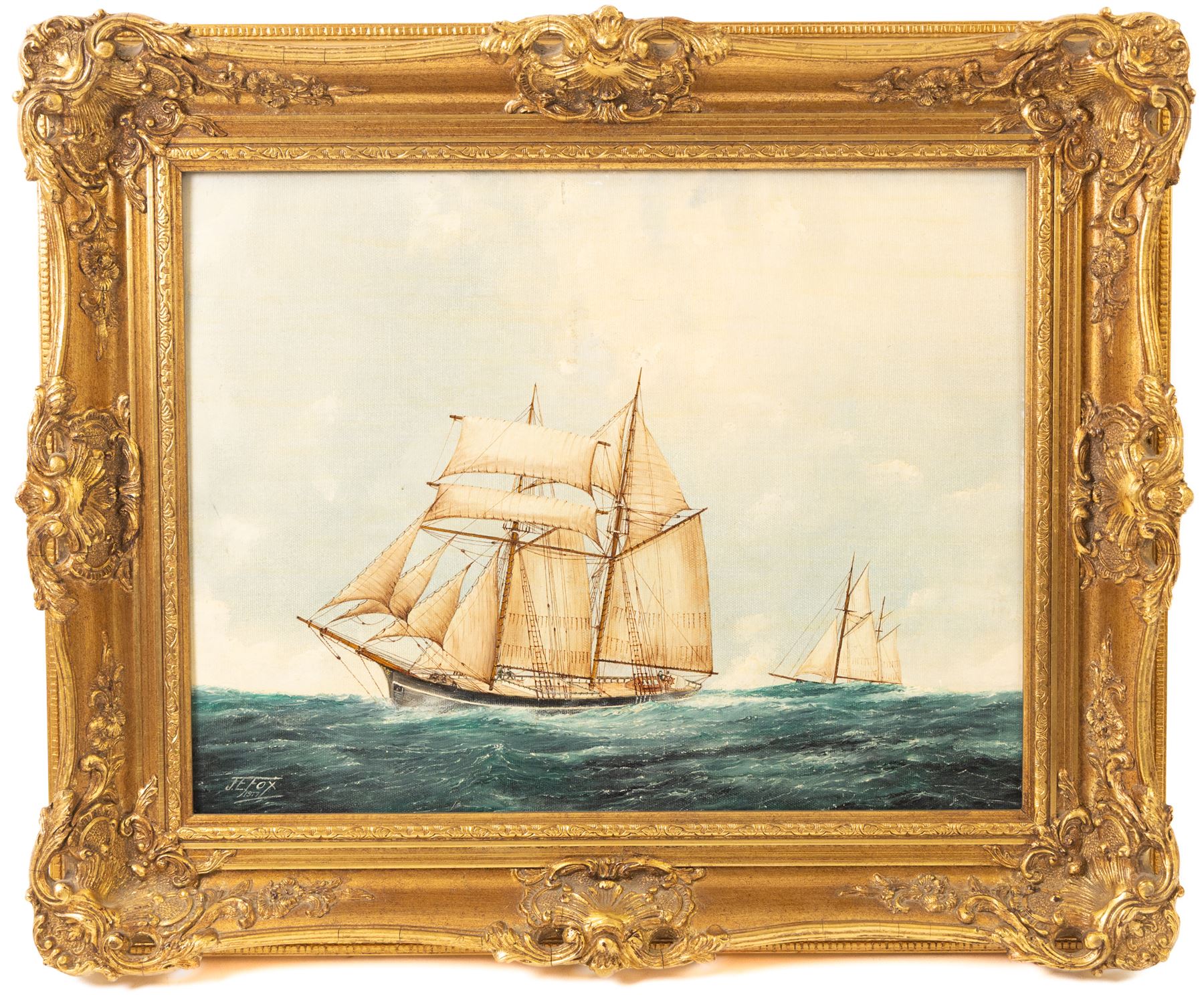 J E Fox (British 20th Century): Sailing Boats at Sea, oil on canvas board signed and dated 1977, 34cm x 44cm 