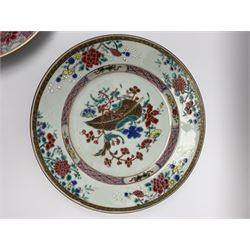 Three 18th century Chinese plates, decorated in the famille rose pallet with various motifs including peonies, prunus blossom, butterflies and phoenix, each approximately D23cm