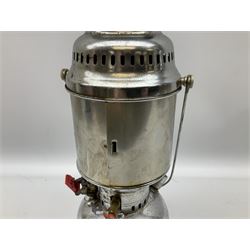 Copper and brass ship’s lamp marked ‘Anchor’, H25cm, Feuer hand storm lantern, Bialaddin Model 315 paraffin lamp and an Anchor lamp (4)