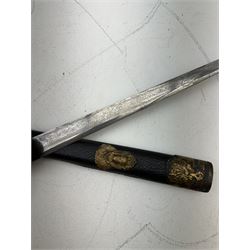 German hunting cutlass 34cm singled edged blade etched, the horn handle with gilt metal acorn devices, the shell guard embossed with crown, in gilt brass mounted leather scabbard with acorn stud, L56cm