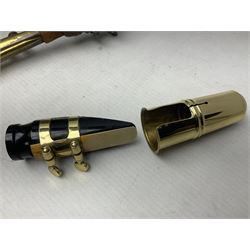 Lacquered brass 'King' alto saxophone inscribed Made by the H.N. White Co.' (Cleveland Ohio) with crook, serial no.84128; also stamped No.1 549 911 and Pat D 8-18-25; in fitted carrying case 