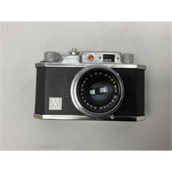 Olympus Fe-5035 digital camera, together with a Polaroid camera, Philips digital photo frame etc