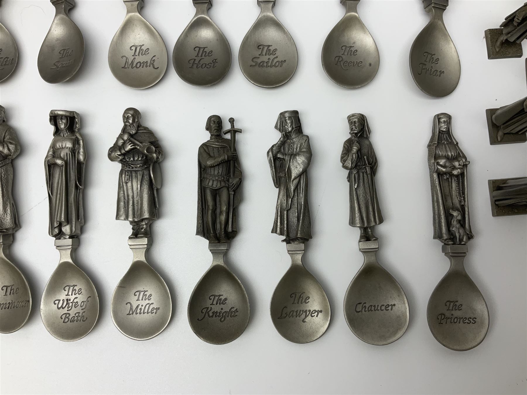 Set of forty three miniature Franklin Mint pewter figures of the Kings and Queens of England, with certificate of authenticity and information cards, together with a collection of twenty four Franklin Mint pewter Charles Dickens character spoons