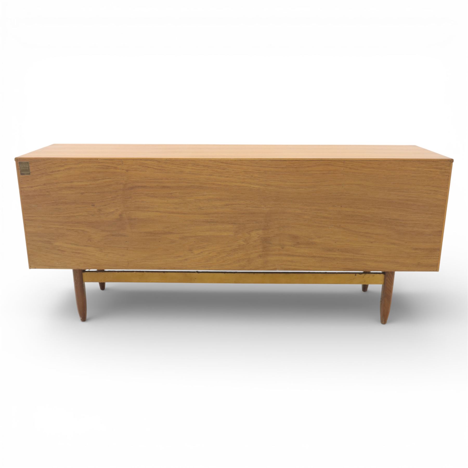 Portwood - Mid 20th century teak sideboard, rectangular top with fall front in the centre flanked by cupboard doors with recessed handles, above four drawers raised on tapered legs